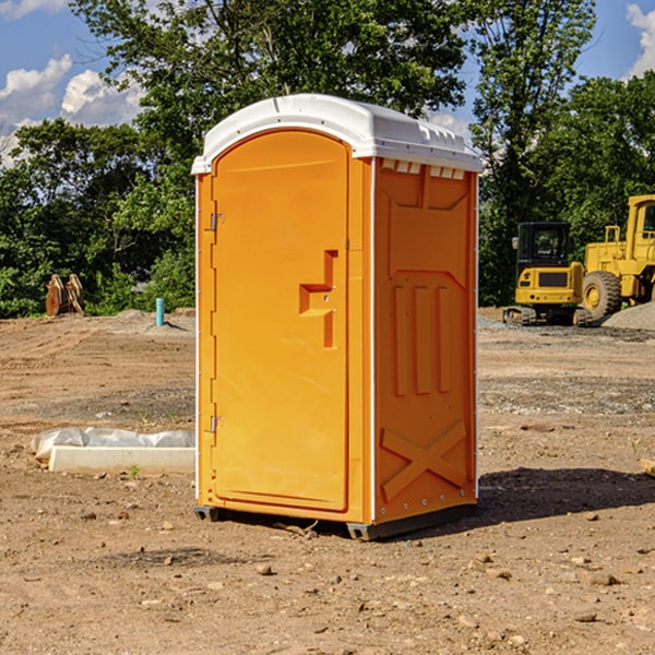 how often are the portable restrooms cleaned and serviced during a rental period in Carrollton